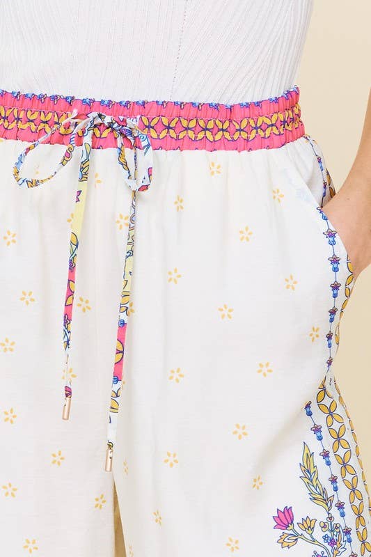 SKIES ARE BLUE - Border Print Wide Leg Pants